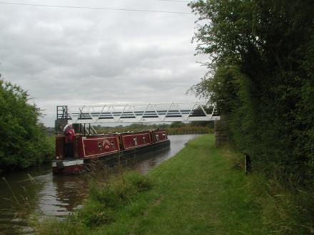 Prees junction is just past the bridge - the arm to the left and Llangollen to the right : Odyssey at Whixall Moss Roving Bridge No 46 (Taken on Monday 12th July 2004)<br />